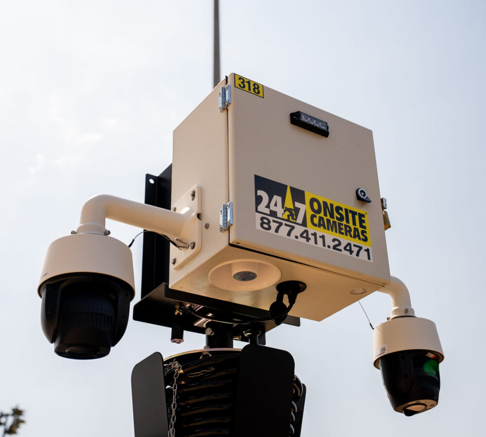 Mounted security cameras and labeled box.