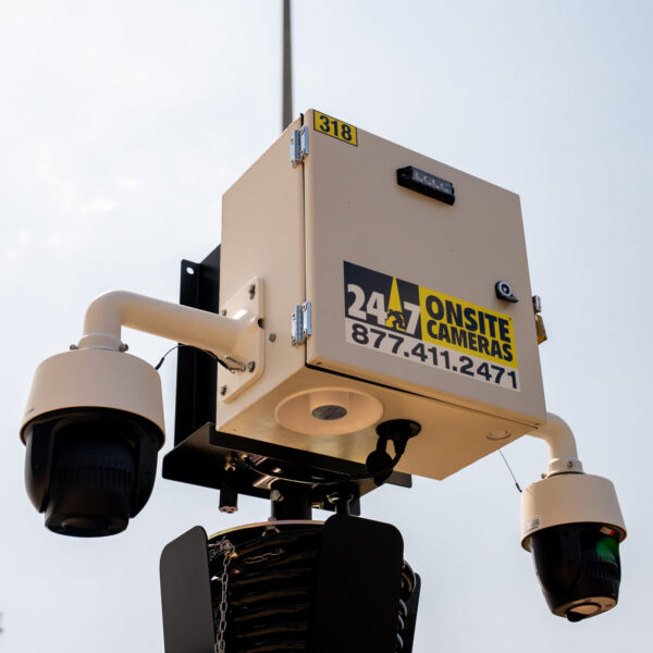 Mounted security cameras and labeled box.