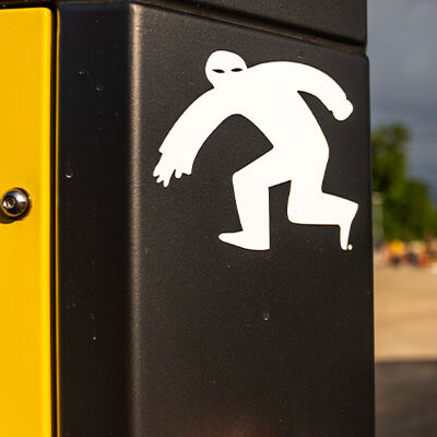 Black and yellow box with 24/7 onsite cameras logo.