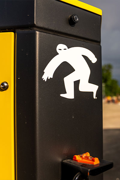 Black and yellow box with 24/7 onsite cameras logo.